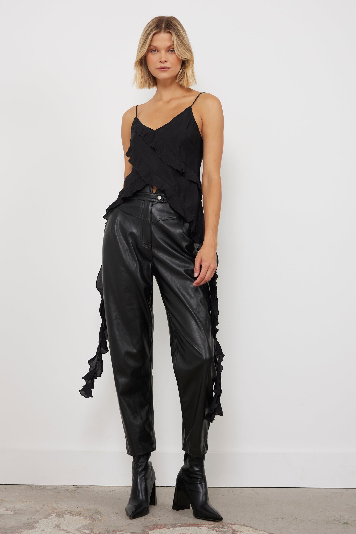 Causing A Ruffle Black Top