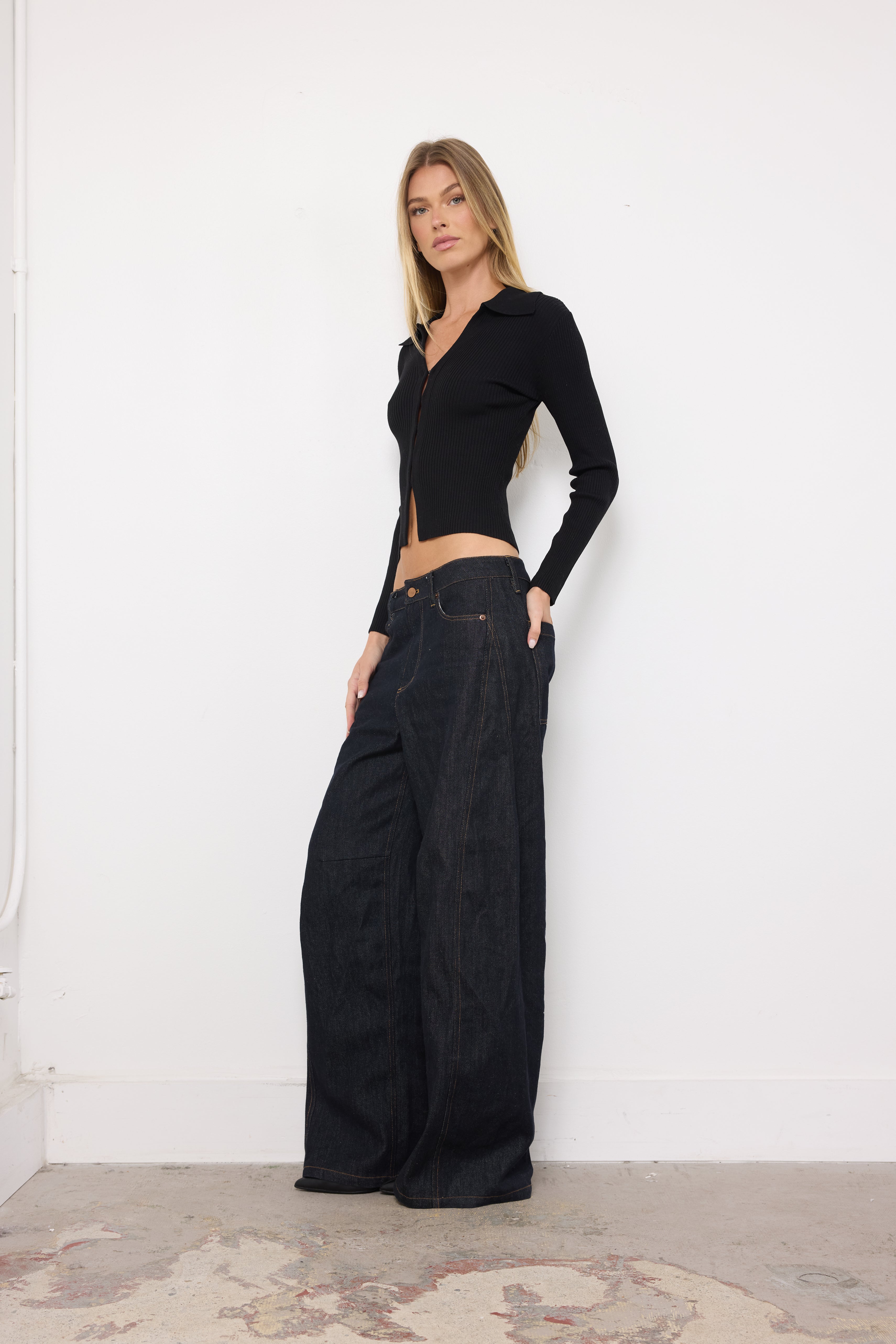 I Feel Something Black Knit Top