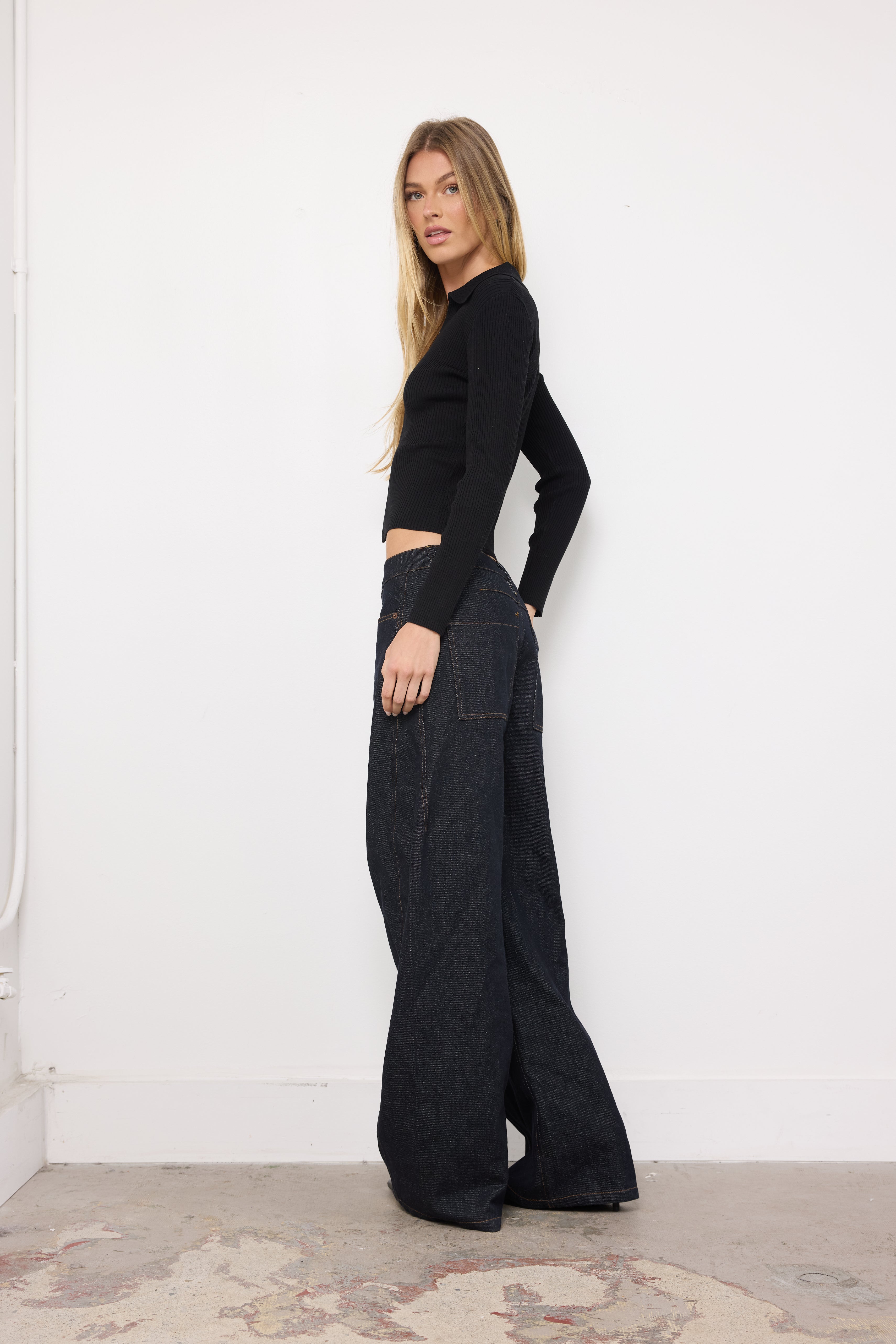 I Feel Something Black Knit Top